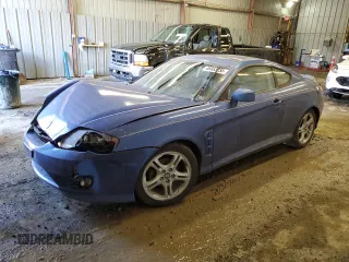 2005 Hyundai Tiburon GT z VIN KMHHN65F95U155274, wystawiony jako Copart lot #46863235 z przebiegiem Nie podano mil oraz Szkody całkowita. Historia ofert i sprzedaży dostępna na DreamBid. Obrazek 1.