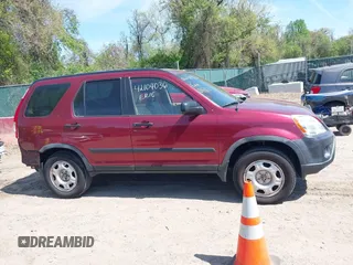 2006 Honda CR-V LX with VIN JHLRD68556C001167, listed as a IAAI auction lot 42104036 with 113,590 mi miles and . Bid and sale history available at DreamBid. Image 14.