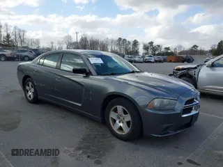 2012 Dodge Charger SE with VIN 2C3CDXBG5CH207587, listed as a IAAI auction lot 41740676 with 230,880 mi miles. Bid and sale history available at carsss.com. Image 1.