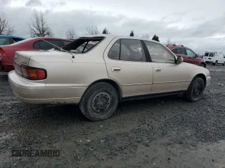 1994 Toyota Camry XLE with VIN JT2GK13E4R0053523, listed as a Copart auction lot 46646995 with 172,091 mi miles and Salvage Title. Bid and sale history available at carsss.com. Image 3.