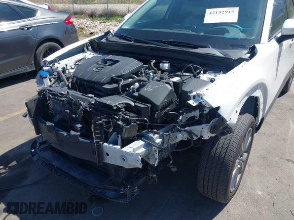 2024 Mazda CX-30 S Premium with VIN 3MVDMBDM8RM633580, listed as a IAAI auction lot 42152915 with 18,679 mi miles and . Bid and sale history available at DreamBid. Image 6.
