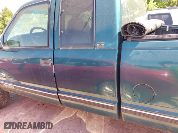 1996 GMC Sierra 1500 z VIN 1GTEK19R6TE514322, wystawiony jako IAAI lot #42253821 z przebiegiem 190 491 mil mil oraz . Historia ofert i sprzedaży dostępna na DreamBid. Obrazek 14.