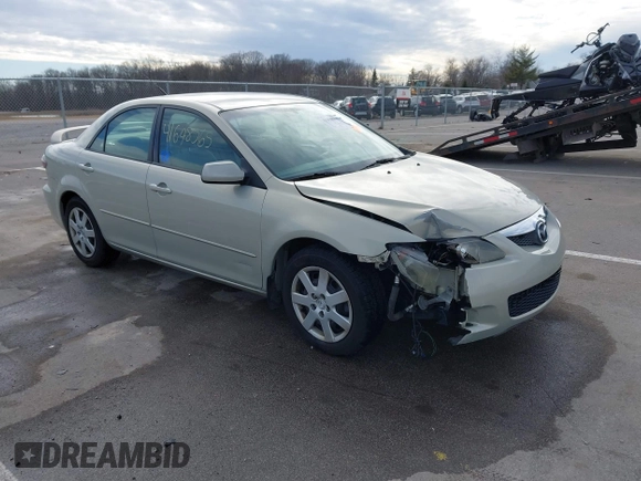 2006 Mazda 6 i with VIN 1YVFP80C665M21354, listed as a IAAI auction lot 41698565 with 155,313 mi miles. Bid and sale history available at carsss.com. Image 1.
