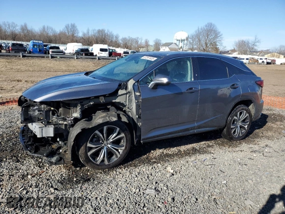 2021 Lexus RX with VIN 2T2HZMDA5MC293551, listed as a Copart auction lot 47297435 with 114,007 mi miles and Salvage Title. Bid and sale history available at carsss.com. Image 1.