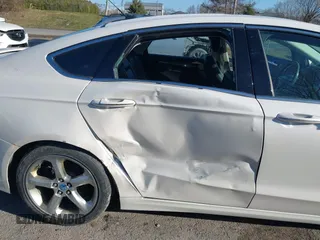 2013 Ford Fusion Titanium with VIN 3FA6P0D99DR147928, listed as a IAAI auction lot 41898122 with 135,693 mi miles. Bid and sale history available at carsss.com. Image 6.