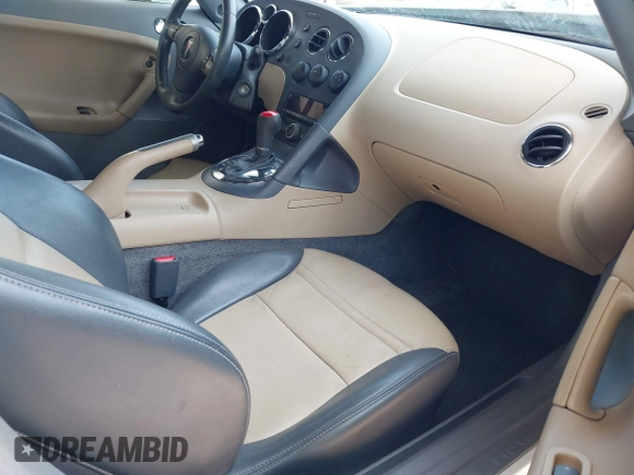 2007 Pontiac Solstice z VIN 1G2MB35B97Y141396, wystawiony jako IAAI lot #42443705 z przebiegiem 118 933 mil mil oraz . Historia ofert i sprzedaży dostępna na DreamBid. Obrazek 5.