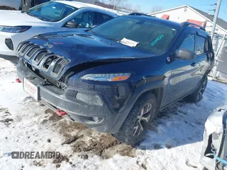 2014 Jeep Cherokee Trailhawk with VIN 1C4PJMBS8EW182259, listed as a IAAI auction lot 41309329 with Not Provided miles. Bid and sale history available at carsss.com. Image 2.