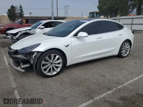 2018 Tesla Model 3 Long Range Battery z VIN 5YJ3E1EA5JF053673, wystawiony jako Copart lot #53091445 z przebiegiem 60 849 mil mil oraz Szkoda całkowita • Salvage title. Historia ofert i sprzedaży dostępna na DreamBid. Obrazek 1.