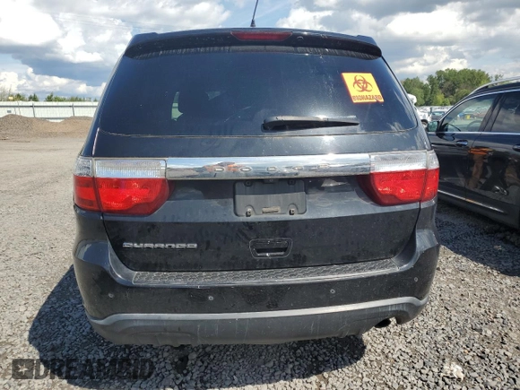 2013 Dodge Durango SXT z VIN 1C4RDHAGXDC698613, wystawiony jako Copart lot #55156025 z przebiegiem 189 685 mil mil oraz Szkoda całkowita • Salvage title. Historia ofert i sprzedaży dostępna na DreamBid. Obrazek 6.