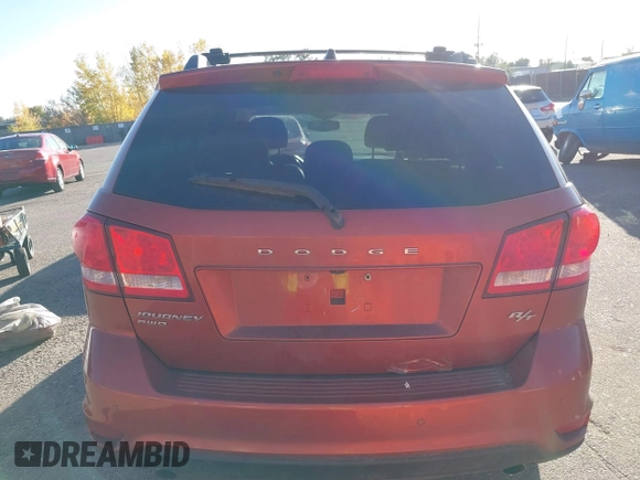 2014 Dodge Journey R/T with VIN 3C4PDDFG4ET104127, listed as a IAAI auction lot 40702930 with 87,058 mi miles and . Bid and sale history available at DreamBid. Image 16.