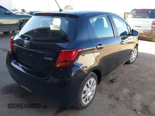 2015 Toyota Yaris L with VIN VNKKTUD32FA030980, listed as a IAAI auction lot 41655132 with 106,826 mi miles and . Bid and sale history available at carsss.com. Image 4.