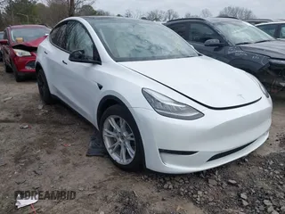 2023 Tesla Model Y Long Range with VIN 7SAYGDEE2PA145398, listed as a IAAI auction lot 41546573 with 20,812 mi miles and . Bid and sale history available at carsss.com. Image 1.