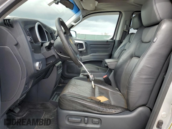 2006 Honda Ridgeline RTL with VIN 2HJYK16586H530898, listed as a Copart auction lot 77734934 with 137,560 mi miles and Clean Title. Bid and sale history available at carsss.com. Image 7.