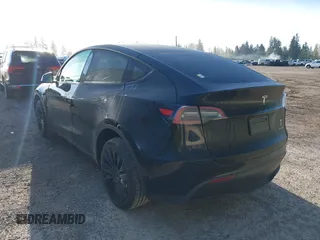 2023 Tesla Model Y Long Range z VIN 7SAYGDEE9PF637042, wystawiony jako IAAI lot #41969086 z przebiegiem 25 524 mil mil oraz . Historia ofert i sprzedaży dostępna na DreamBid. Obrazek 3.