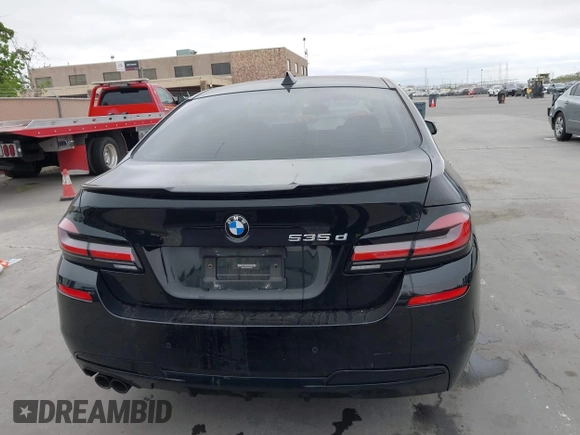 2014 BMW 5 Series 535d with VIN WBAXA5C59ED690375, listed as a IAAI auction lot 42030902 with 70,553 mi miles and . Bid and sale history available at carsss.com. Image 16.