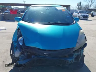2013 Honda Fit Sport with VIN JHMGE8H56DC034820, listed as a IAAI auction lot 41737797 with 157,846 mi miles. Bid and sale history available at carsss.com. Image 6.