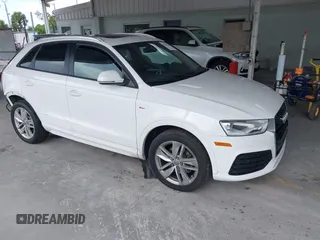 2018 Audi Q3 Premium z VIN WA1BCCFS1JR008089, wystawiony jako IAAI lot #42661862 z przebiegiem 49 307 mil mil oraz . Historia ofert i sprzedaży dostępna na DreamBid. Obrazek 1.