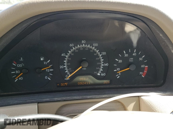 1999 Mercedes-Benz E-Class with VIN WDBJF65H5XA804902, listed as a Copart auction lot 73704634 with 92,411 mi miles and Salvage Title. Bid and sale history available at carsss.com. Image 9.