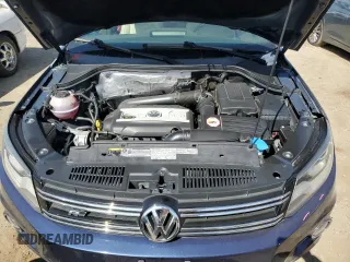 2015 Volkswagen Tiguan SE with VIN WVGAV7AX2FW094359, listed as a Copart auction lot 60101885 with 106,305 mi miles and Salvage title. Bid and sale history available at DreamBid. Image 12.