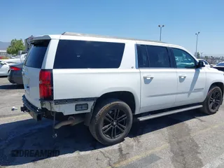 2017 Chevrolet Suburban LT z VIN 1GNSKHKC7HR325641, wystawiony jako IAAI lot #42290768 z przebiegiem 91 802 mil mil oraz . Historia ofert i sprzedaży dostępna na DreamBid. Obrazek 4.