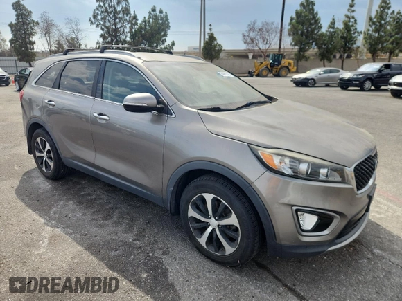 2016 Kia Sorento EX with VIN 5XYPH4A54GG094512, listed as a Copart auction lot 64965125 with 162,565 mi miles and Salvage title. Bid and sale history available at DreamBid. Image 4.