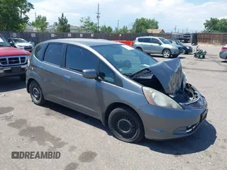 2013 Honda Fit with VIN JHMGE8H37DC023372, listed as a IAAI auction lot 40006280 with 117,791 mi miles. Bid and sale history available at carsss.com. Image 1.
