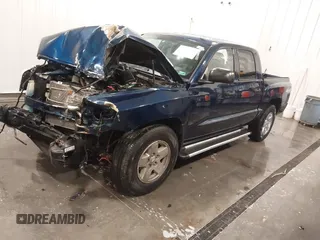 2005 Dodge Dakota SLT with VIN 1D7HW48N45S275932, listed as a IAAI auction lot 41763401 with 100,819 mi miles. Bid and sale history available at carsss.com. Image 2.