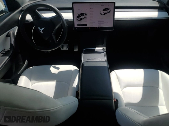 2022 Tesla Model Y Performance with VIN 7SAYGDEFXNF407340, listed as a Copart auction lot 54376895 with 56,709 mi miles and Salvage Title. Bid and sale history available at DreamBid. Image 8.