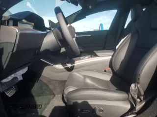 2024 Tesla Model S z VIN 5YJSA1E57RF545269, wystawiony jako Copart lot #87419784 z przebiegiem Nie podano mil oraz Szkoda całkowita • Salvage title. Historia ofert i sprzedaży dostępna na DreamBid. Obrazek 7.