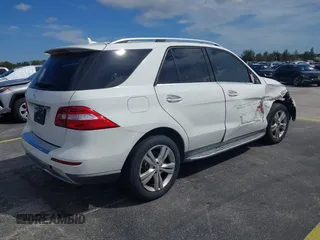 2015 Mercedes-Benz M 350 with VIN 4JGDA5JB9FA590659, listed as a IAAI auction lot 40591295 with 117,825 mi miles and . Bid and sale history available at DreamBid. Image 4.