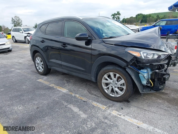 2019 Hyundai Tucson Value with VIN KM8J33A40KU068014, listed as a IAAI auction lot 40877057 with 34,966 mi miles. Bid and sale history available at carsss.com. Image 1.