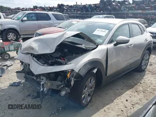 2023 Mazda CX-30 S Select with VIN 3MVDMBBM6PM518380, listed as a IAAI auction lot 40720006 with 13,422 mi miles and . Bid and sale history available at DreamBid. Image 2.