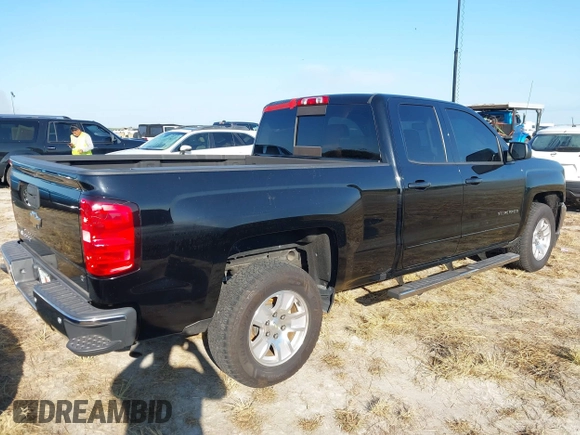 2018 Chevrolet Silverado 1500 LT with VIN 1GCRCREH0JZ348816, listed as a IAAI auction lot 40605540 with Not Provided miles and . Bid and sale history available at DreamBid. Image 4.
