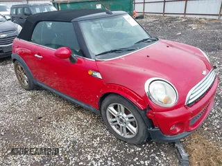 2011 MINI Convertible z VIN WMWZN3C55BT132820, wystawiony jako IAAI lot #42407756 z przebiegiem Nie podano mil oraz . Historia ofert i sprzedaży dostępna na DreamBid. Obrazek 1.