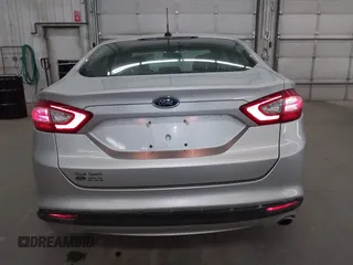 2013 Ford Fusion SE Hybrid with VIN 3FA6P0LU7DR228691, listed as a IAAI auction lot 42055540 with 144,389 mi miles and . Bid and sale history available at DreamBid. Image 16.