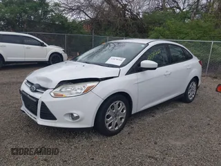 2012 Ford Focus SE with VIN 1FAHP3F21CL201889, listed as a IAAI auction lot 42070260 with 126,650 mi miles. Bid and sale history available at carsss.com. Image 2.