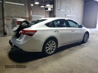 2015 Toyota Avalon Limited with VIN 4T1BK1EB6FU186515, listed as a Copart auction lot 54027865 with 104,000 mi miles and Salvage Title. Bid and sale history available at DreamBid. Image 3.