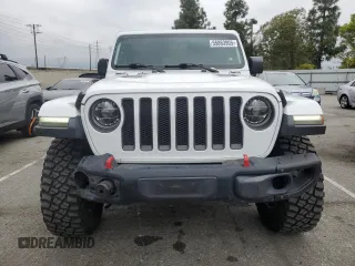 2018 Jeep Wrangler Unlimited Rubicon z VIN 1C4HJXFGXJW258554, wystawiony jako Copart lot #55863905 z przebiegiem 60 492 mil mil oraz Szkoda całkowita • Salvage title. Historia ofert i sprzedaży dostępna na DreamBid. Obrazek 5.