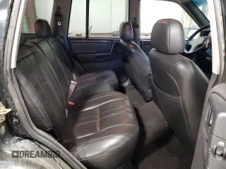 1998 Jeep Grand Cherokee Laredo with VIN 1J4GZ58Y9WC122076, listed as a Copart auction lot 84221784 with 387,353 mi miles and Salvage Title. Bid and sale history available at carsss.com. Image 11.