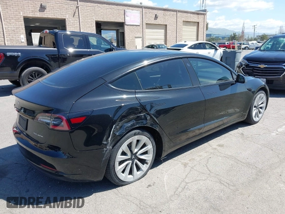 2021 Tesla Model 3 Long Range with VIN 5YJ3E1EB4MF064631, listed as a IAAI auction lot 41424856 with 95,511 mi miles and . Bid and sale history available at DreamBid. Image 4.