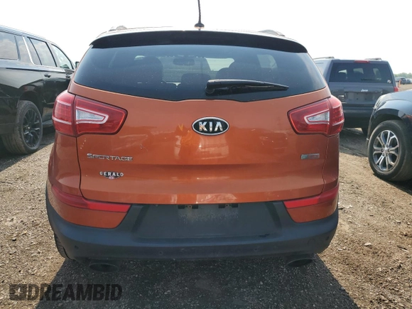 2011 Kia Sportage SX with VIN KNDPC3A63B7169255, listed as a Copart auction lot 60174855 with 121,236 mi miles and Salvage title. Bid and sale history available at DreamBid. Image 6.