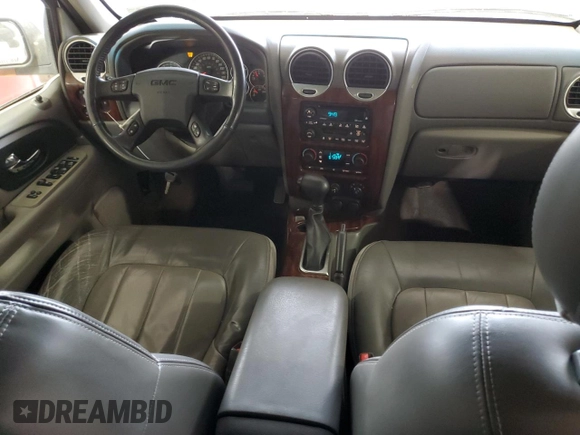 2003 GMC Envoy SLE z VIN 1GKDT13S432136642, wystawiony jako Copart lot #53467095 z przebiegiem 98 832 mil mil oraz Szkoda całkowita • Salvage title. Historia ofert i sprzedaży dostępna na DreamBid. Obrazek 8.