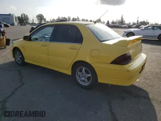 2002 Mitsubishi Lancer OZ-Rally with VIN JA3AJ86E82U071265, listed as a Copart auction lot 77711904 with 174,088 mi miles and Salvage Title. Bid and sale history available at carsss.com. Image 2.