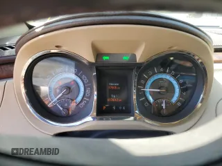2013 Buick LaCrosse Premium 2 z VIN 1G4GH5E33DF158435, wystawiony jako Copart lot #56209755 z przebiegiem 77 565 mil mil oraz Szkoda całkowita • Salvage title. Historia ofert i sprzedaży dostępna na DreamBid. Obrazek 9.