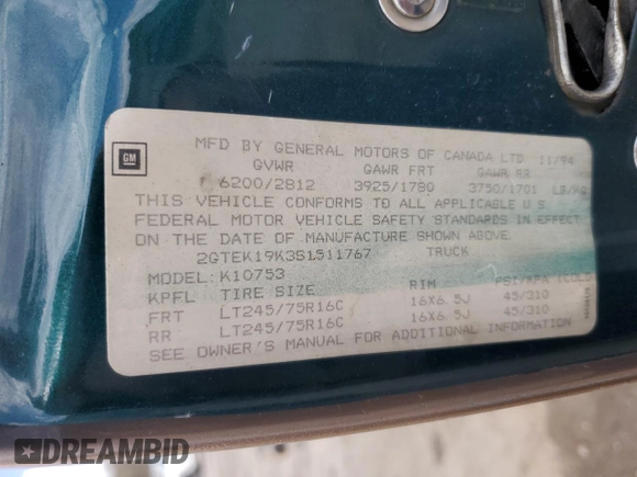 1995 GMC Sierra 1500 z VIN 2GTEK19K3S1511767, wystawiony jako Copart lot #51977295 z przebiegiem 215 667 mil mil oraz Szkody całkowita. Historia ofert i sprzedaży dostępna na DreamBid. Obrazek 13.