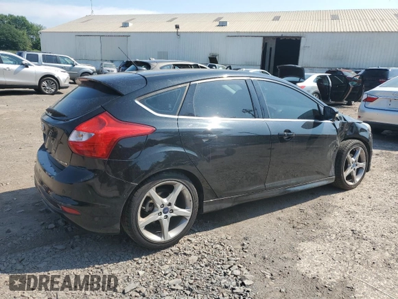 2014 Ford Focus Titanium with VIN 1FADP3N27EL251229, listed as a Copart auction lot 62201195 with 75,534 mi miles and Salvage title. Bid and sale history available at DreamBid. Image 3.