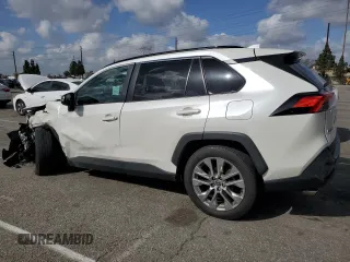 2021 Toyota RAV4 XLE Premium with VIN 2T3C1RFV1MW180625, listed as a Copart auction lot 51799175 with 63,692 mi miles and Salvage title. Bid and sale history available at DreamBid. Image 2.