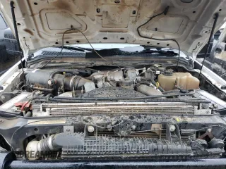 2010 Ford F-450 with VIN 1FDAW4GR9AEA90411, listed as a Copart auction lot 49918415 with 165,870 mi miles and Salvage title. Bid and sale history available at DreamBid. Image 11.