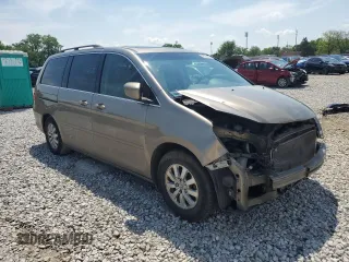2010 Honda Odyssey EX-L z VIN 5FNRL3H78AB003913, wystawiony jako Copart lot #56782895 z przebiegiem 258 094 mil mil oraz Szkoda całkowita • Salvage title. Historia ofert i sprzedaży dostępna na DreamBid. Obrazek 4.