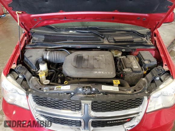 2014 Dodge Grand Caravan American Value with VIN 2C4RDGBG4ER230054, listed as a Copart auction lot 54412435 with 68,237 mi miles and Non Repairable. Bid and sale history available at DreamBid. Image 12.